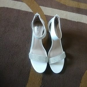 Like new white and silver wedding shoe
